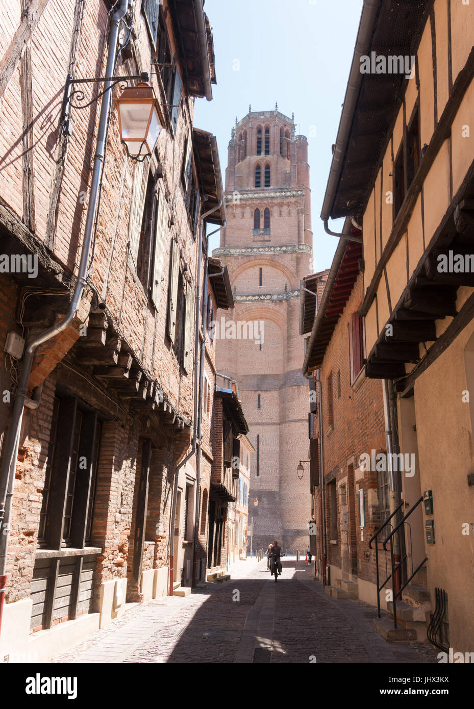 The tower of Albi cathedral seen from the  Rue du Castelviel in the old town, France Stock Photo