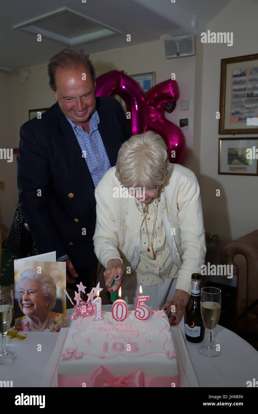 Sundridge Park,UK,16th July 2017,Dolly Hill celebrates her 105th Birthday at Sundridge Park Golf Club as she cut her cake she was surrounded by family and friends and also received a Birthday Card from the Queen©Keith Larby/Alamy Live News Stock Photo