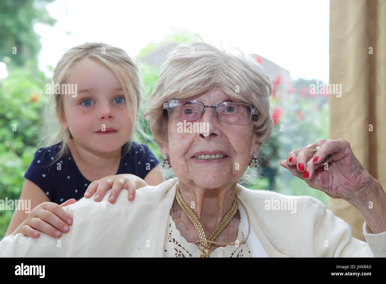 Sundridge Park,UK,16th July 2017,Dolly Hill celebrates her 105th Birthday at Sundridge Park Golf Club She posed with her great great grandaughter  Tilly, she also received a Birthday Card from the Queen©Keith Larby/Alamy Live News Stock Photo