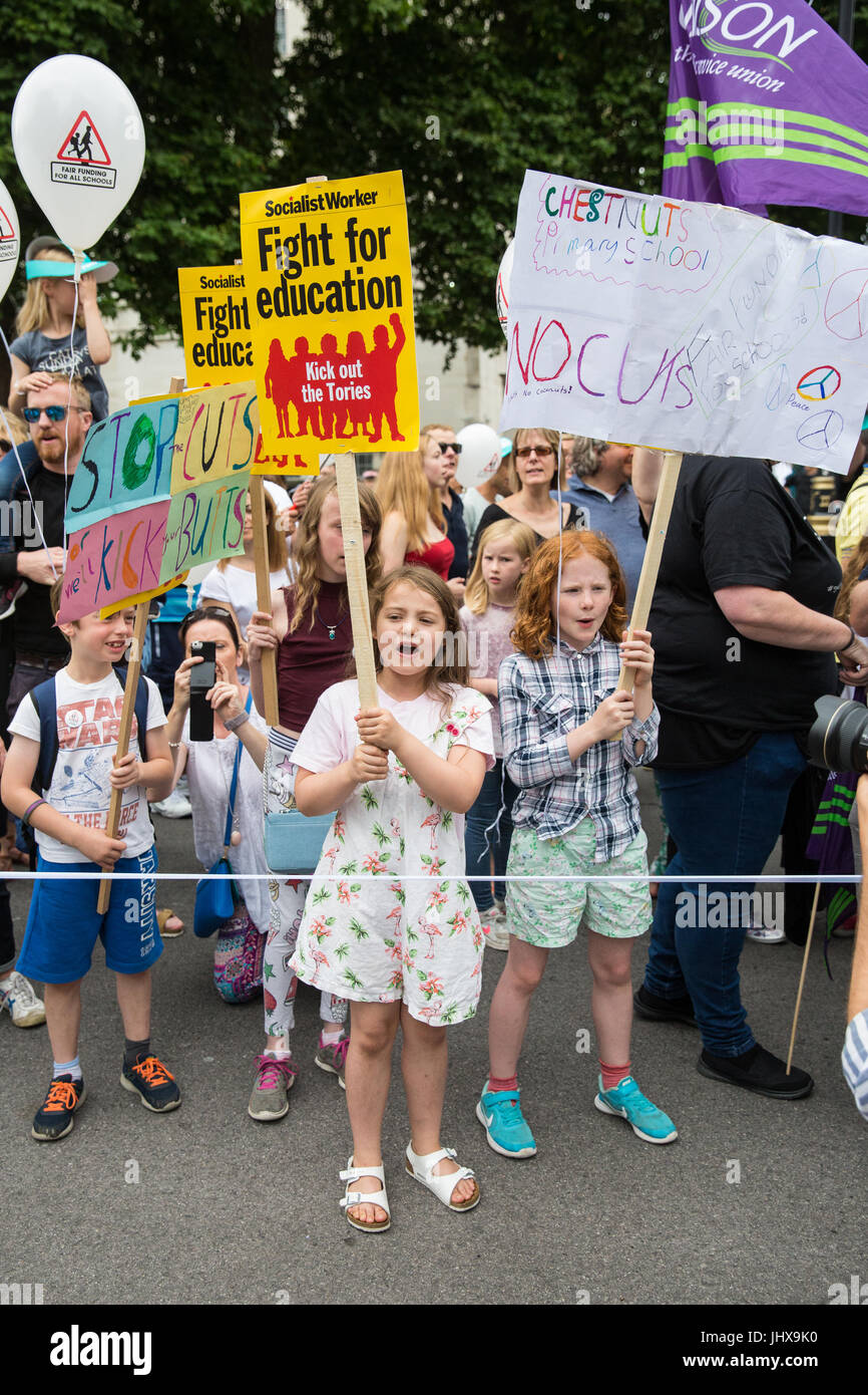 London, UK. 16th July, 2017. Children among campaigners against cuts to education funding and their families marching to Parliament Square as part of a Carnival Against The Cuts protest organised by Fair Funding For All Schools. Credit: Mark Kerrison/Alamy Live News Stock Photo