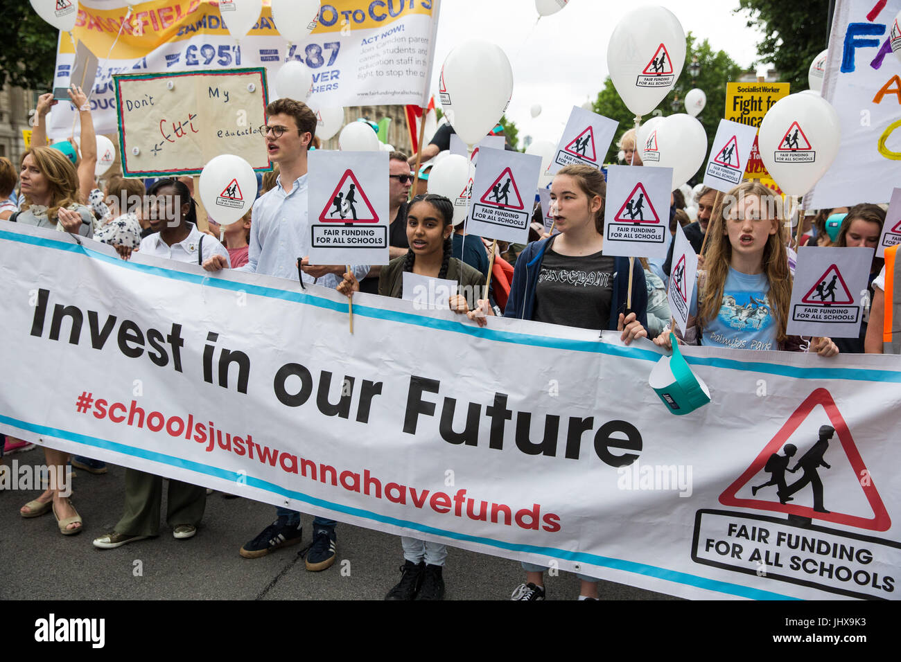 London, UK. 16th July, 2017. Campaigners against cuts to education funding and their families march to Parliament Square as part of a Carnival Against The Cuts protest organised by Fair Funding For All Schools. Credit: Mark Kerrison/Alamy Live News Stock Photo