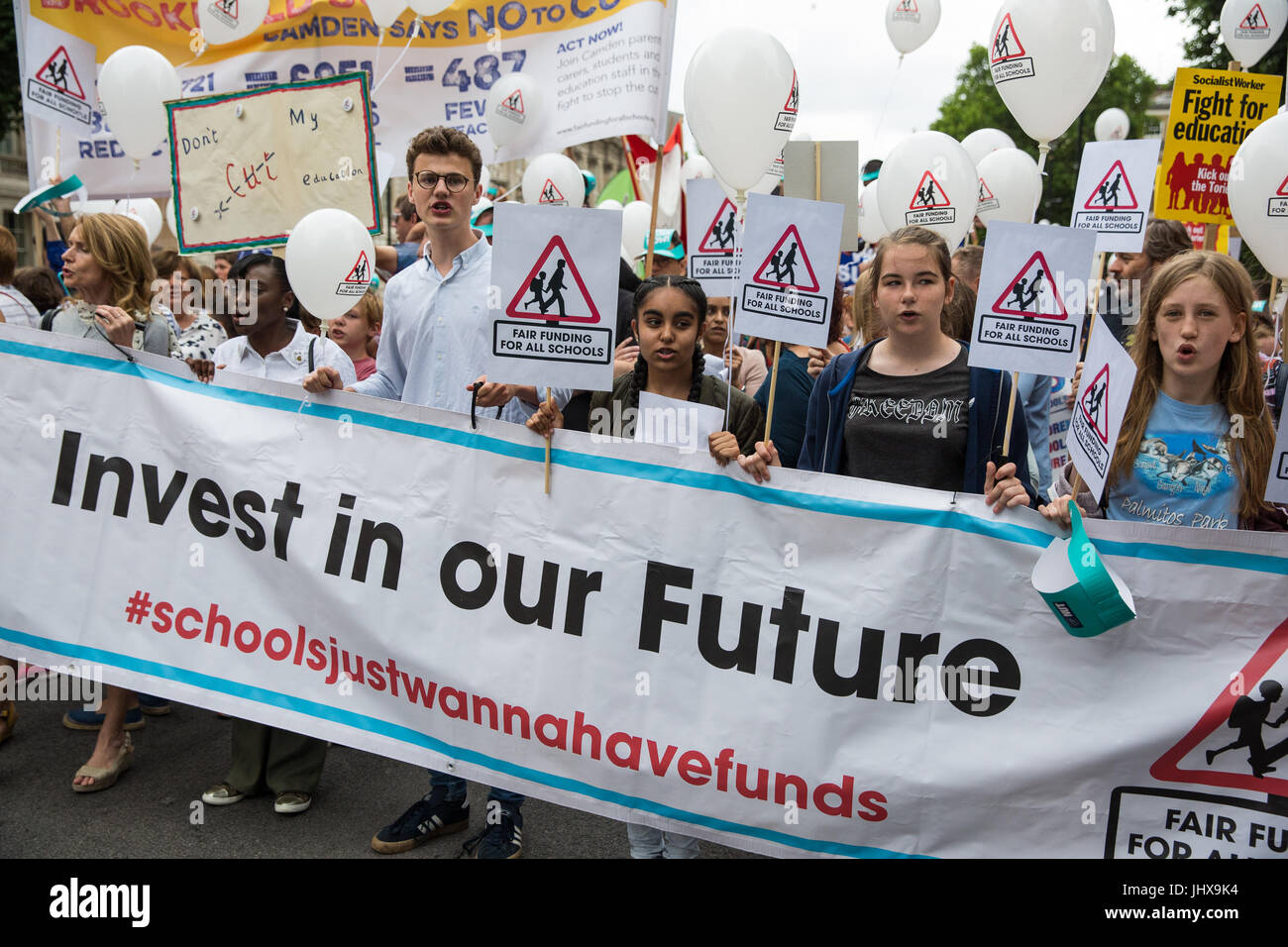 London, UK. 16th July, 2017. Campaigners against cuts to education funding and their families march to Parliament Square as part of a Carnival Against The Cuts protest organised by Fair Funding For All Schools. Credit: Mark Kerrison/Alamy Live News Stock Photo