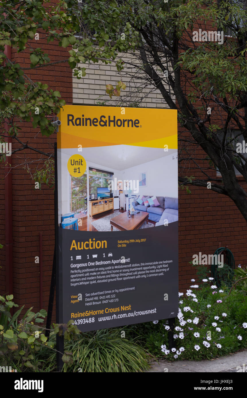 Raine &Horne real estate sign to auction 1 bed unit in Wollstonecraft