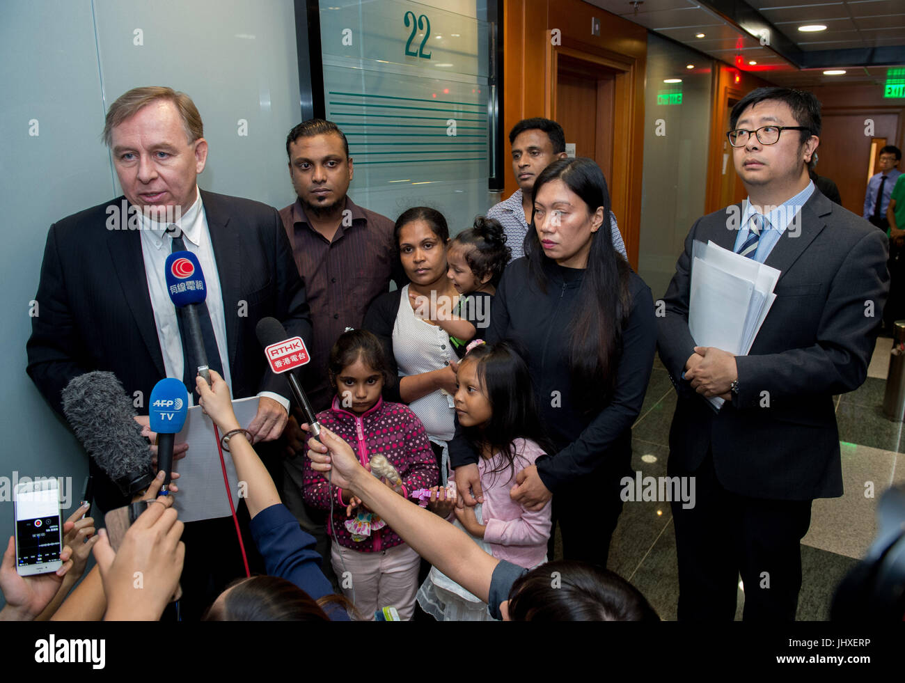 Hong Kong, Hong Kong SAR, China. 17th July, 2017. The Snowden Guardian angels appear at the Torture claims appeal Board.Despite arriving in Hong Kong in different years the families claims have been link due to their harbouring of whistleblower Edward Snowden. Barrister Robert Tibbo speaks to the press (L), Supun Thilina Kellapatha (2nd L with his daughter Sethumdi), Nadeeka Dilrukshi Nonis (3rd Left with her son Dinath), Ajith Puspa(3rd R), Vanessa Mae Rodel (2nd R with her daughter Keana)and lawyer Jonathan Man Credit: Jayne Russell/ZUMA Wire/Alamy Live News Stock Photo