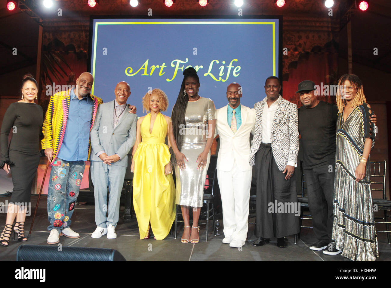 Bridgehampton, New York, NY-July 15: (L-R) Soledad O'Brien, Danny Simmons, Russell Simmons, Esi Eggleston (Honoree), Bozoma Saint John, Stephen G. Hill, Sanford Biggers, Chuck D, and Tangie Murray attend The 2017 RUSH Philanthropic's  Art For Life held at Fairview Farms on July 15, 2017 in Bridgehampton, New York. Photo Credit: Mpi43 /MediaPunch Stock Photo