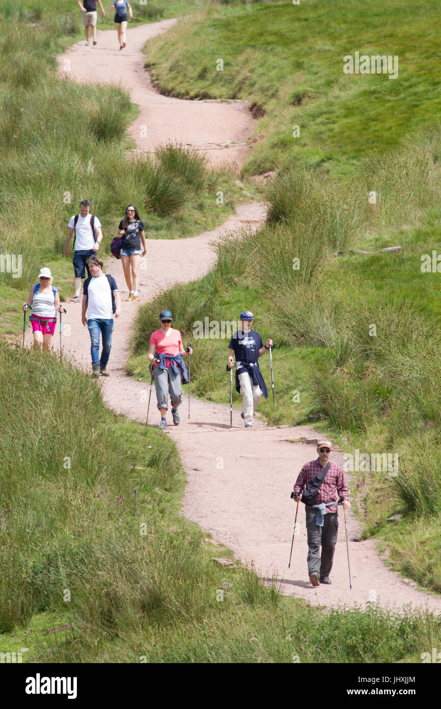 Pont Yr Daf., Brecon Beacons, South Wales, UK. 17th July, 2017. UK weather: People climb the walk to the top of Pen-Y-Fan today in sunny weather, as parts of the UK reach 26 degrees. Credit: Andrew Bartlett/Alamy Live News Stock Photo