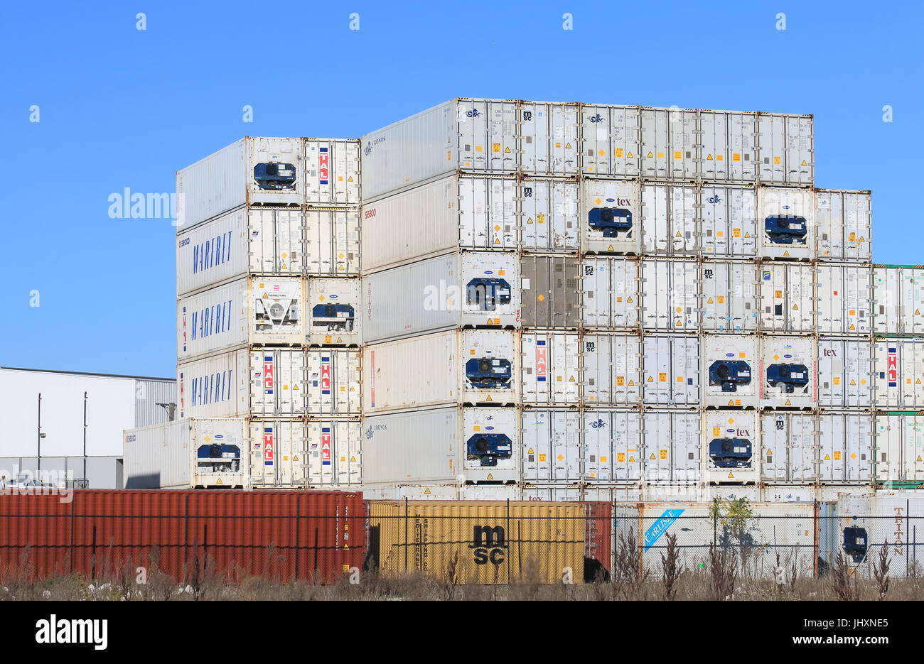 Cargo containers piled up at Port of Melbourne dock in Melbourne Australia Stock Photo Alamy