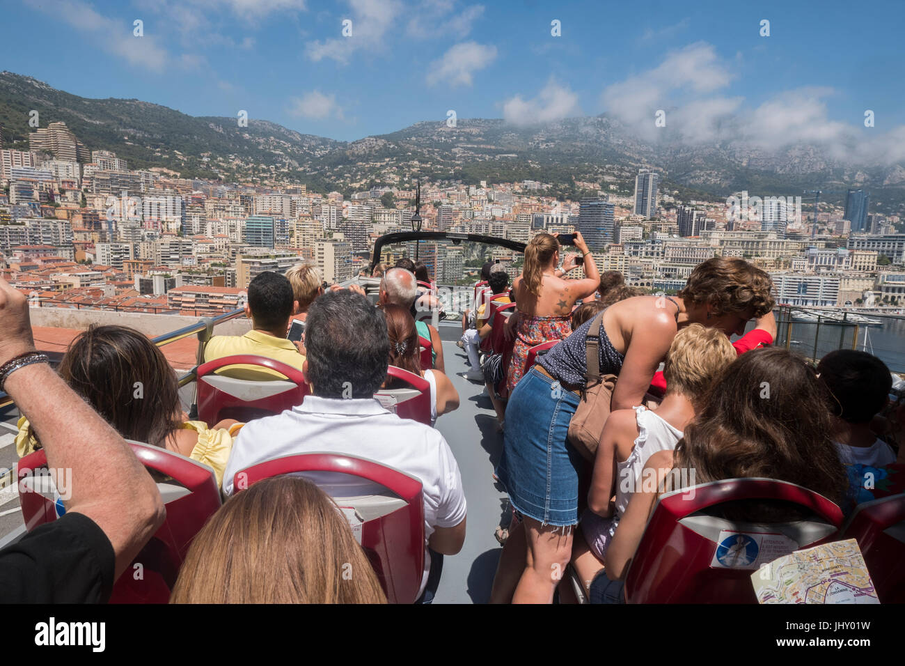Tourists on a guided tour with a Hop on Hop off bus, Monte Carlo, Monaco. Stock Photo