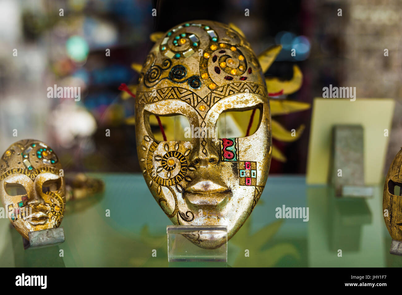 venetian mask in gold design - placed in the stores of Venice Stock ...