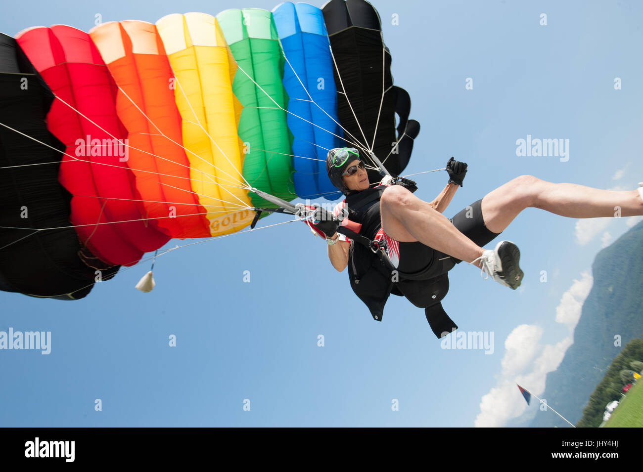 A skydiver practicing accuracy landing in Gordola, Switzerland Stock Photo