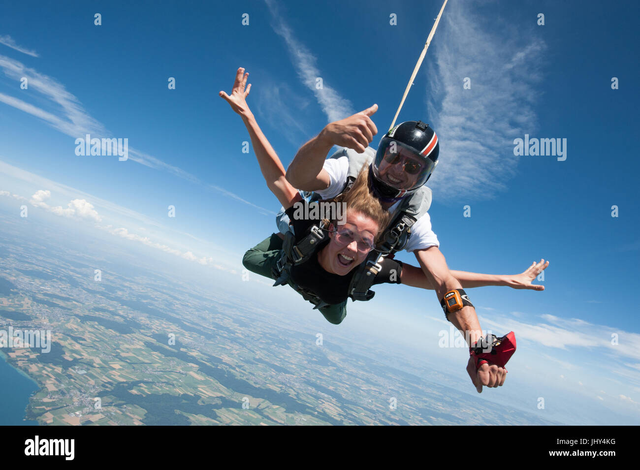 Girl doing a first tandem skydive Stock Photo