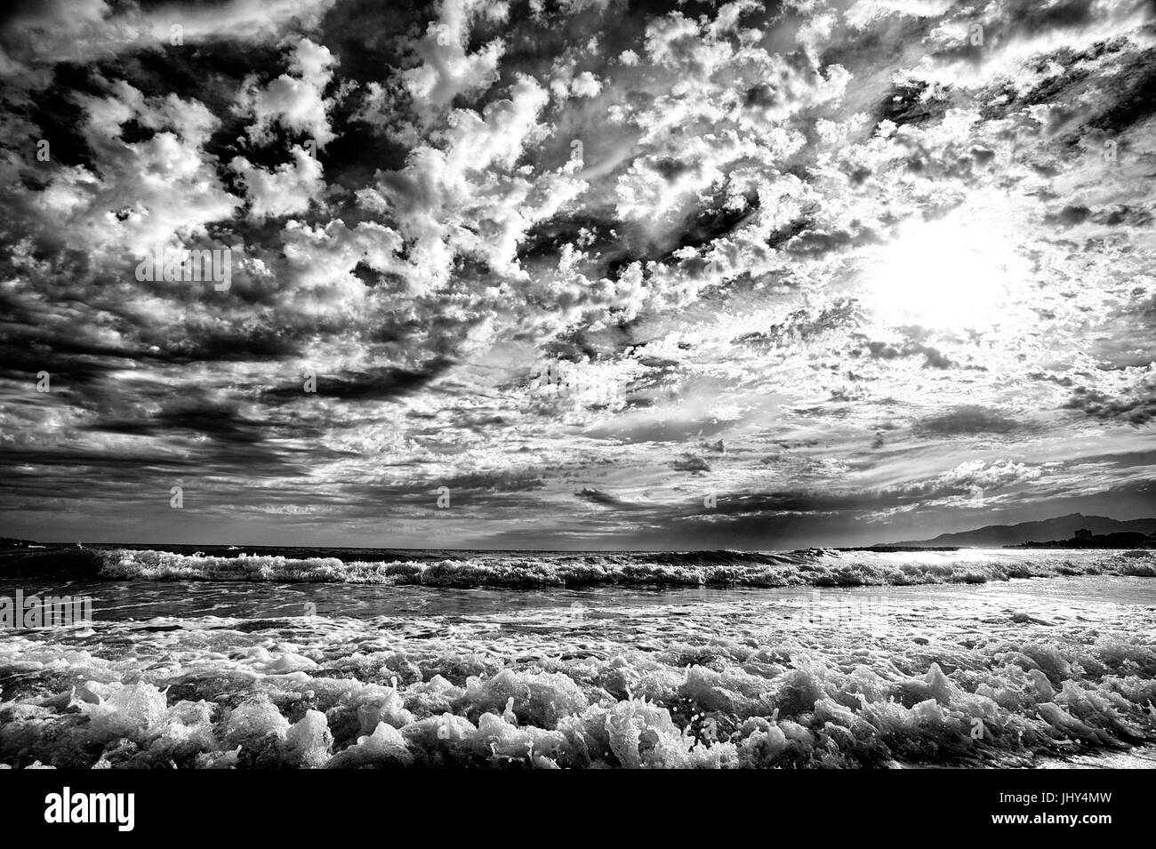 Sky an sea show similar patterns in Cambrils, Spain Stock Photo