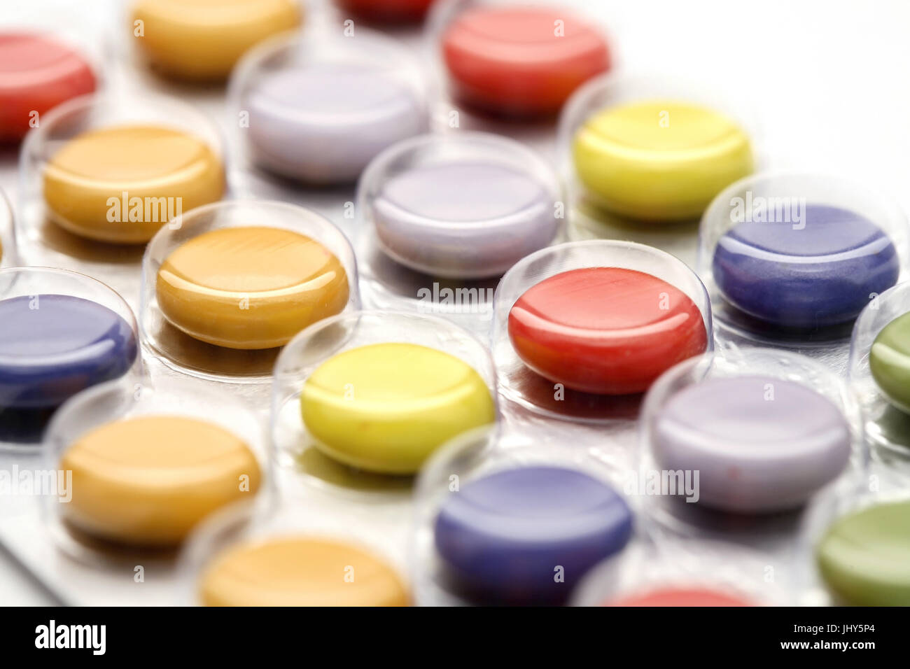 Coloured tablets, Bunte Tabletten Stock Photo - Alamy