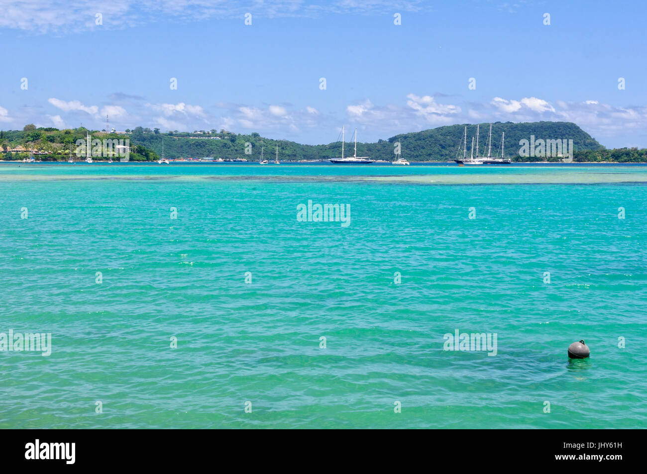 Yachts and tall ships on anchor in Vila Bay - Port Vila, Efate Island, Vanuatu Stock Photo