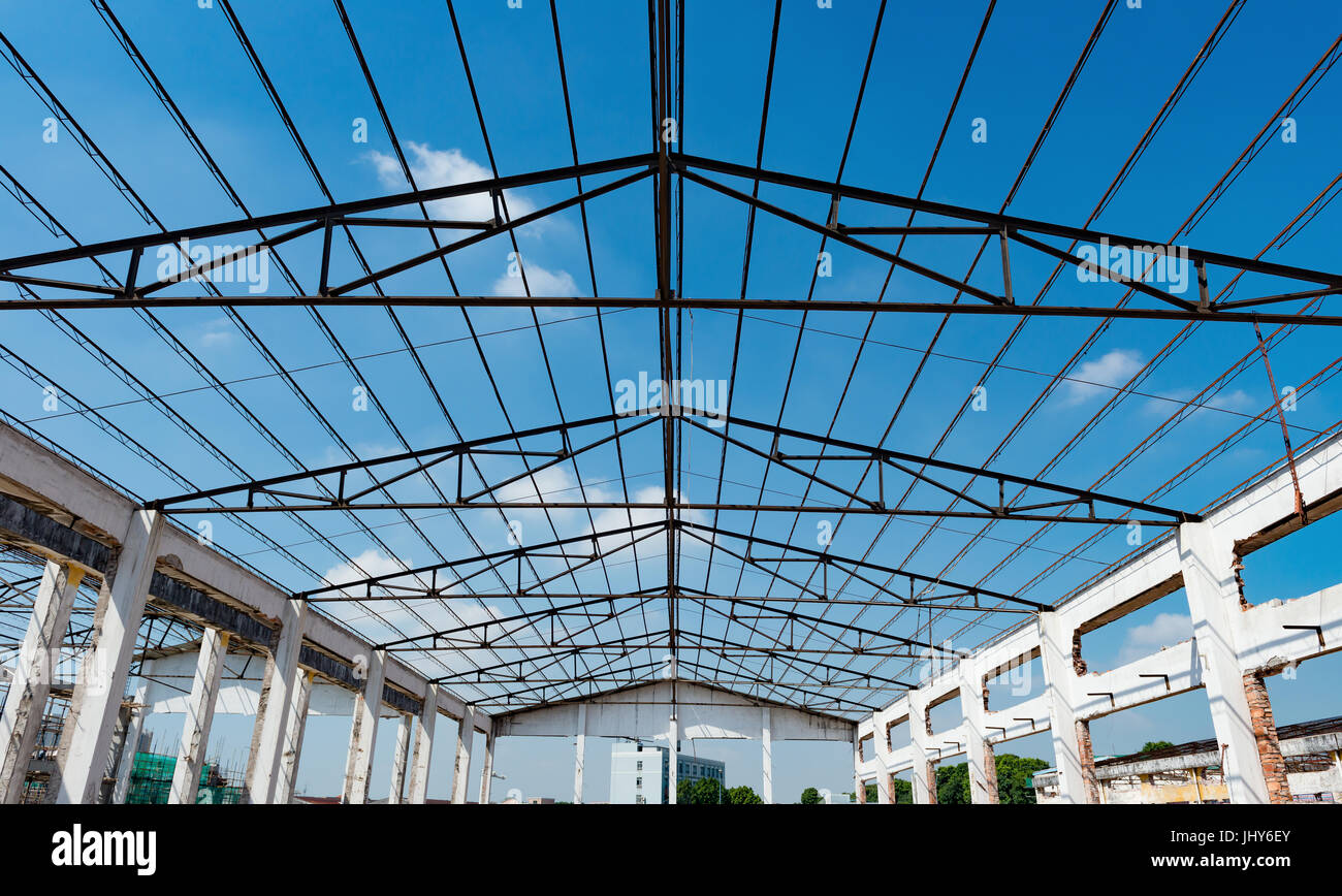 Demolition of an old building with roof only under blue sky Stock Photo ...