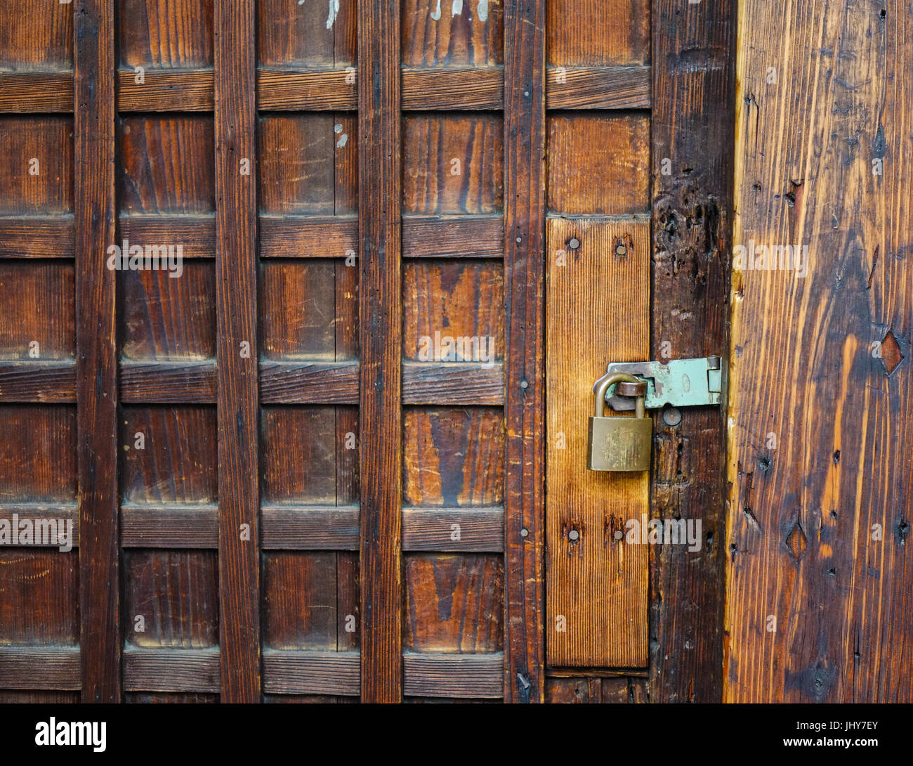 Japanese wooden door with the lock at the Shinto temple in Kyoto, Japan