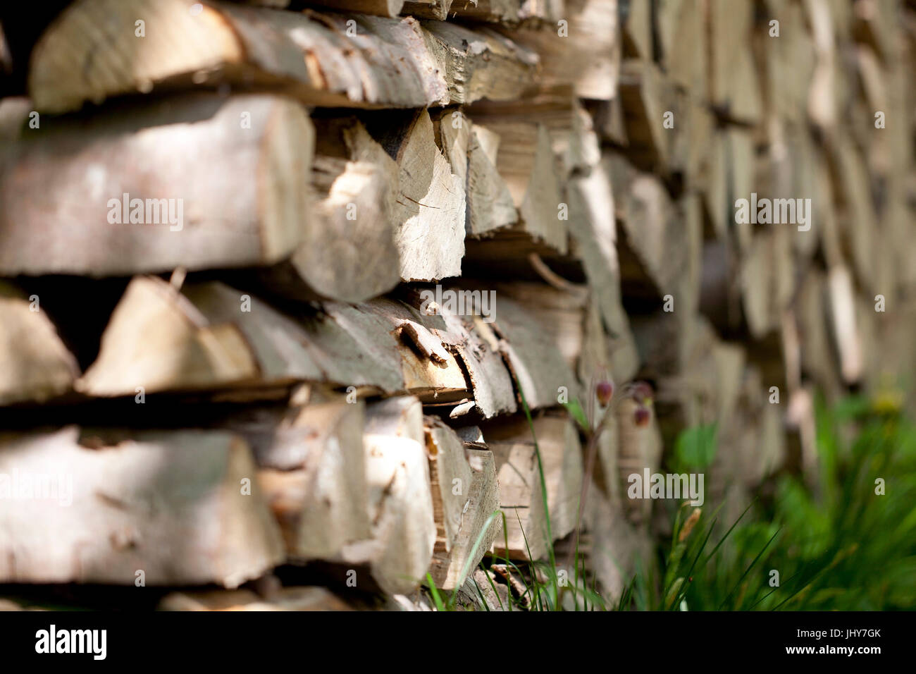 Firewood pile, fire wood, wooden pile - stack of firewood, Brennholzstapel, Feuerholz, Holzstapel - Stack of firewood Stock Photo
