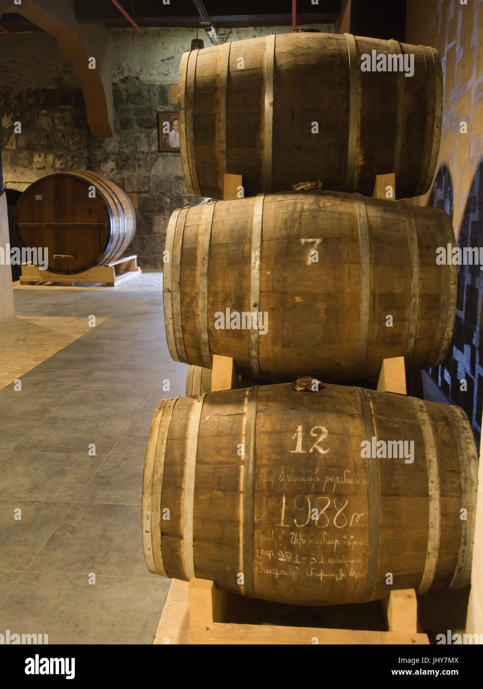 Armenia is famous amongst other for its brandy, which they locally call cognac, here the headquarters of Ararat in Yerevan, oak barrels in storage Stock Photo