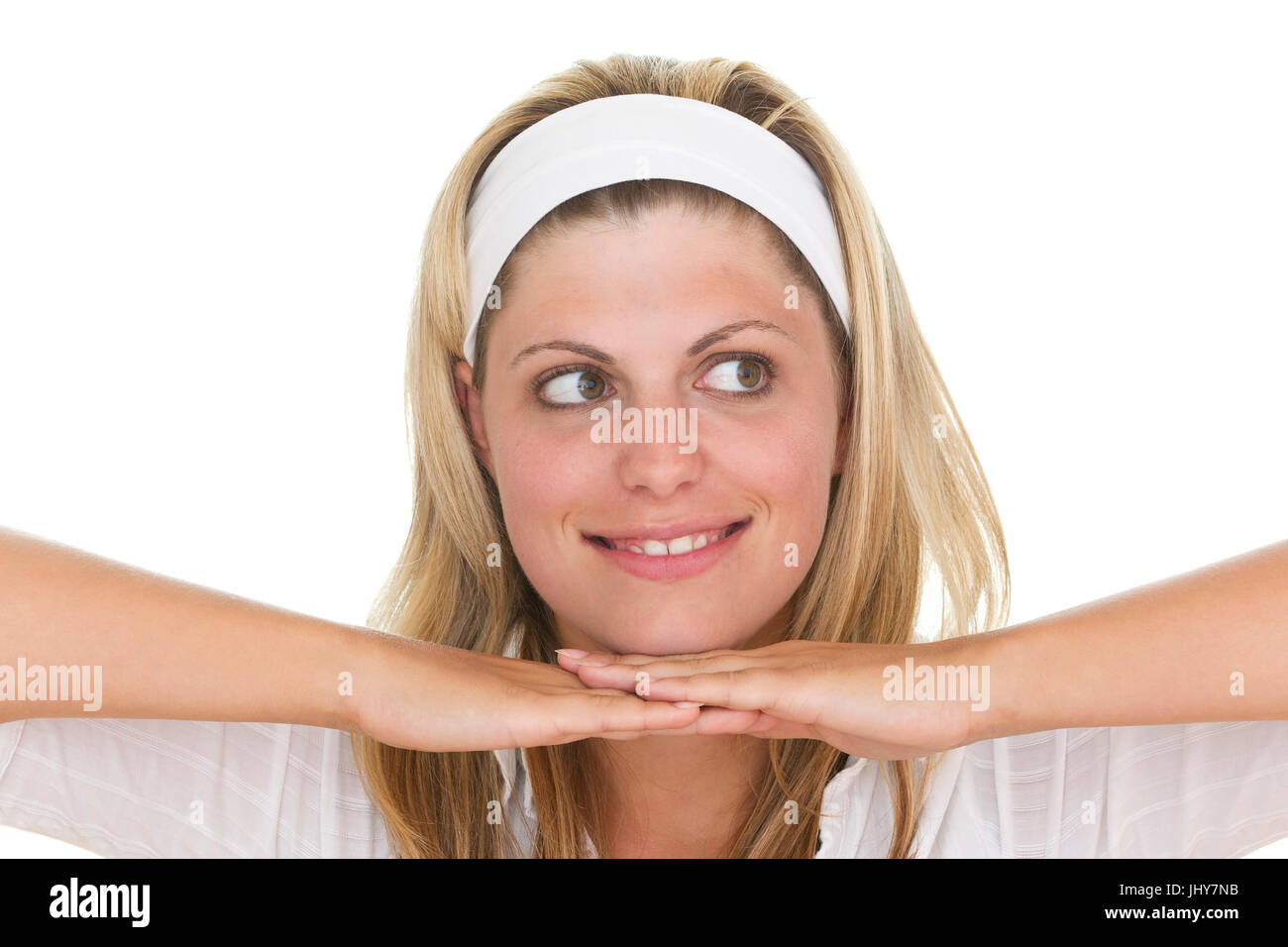 Young woman supports her chin on the hands - Young woman base here chin on here hands, Junge Frau stützt ihr Kinn auf die Hände - Young woman base her Stock Photo