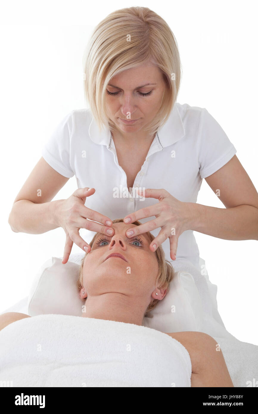 Woman receives a scalp massage - Woman receives a head massage, Frau erhält eine Kopfmassage - Woman receives a head massage Stock Photo