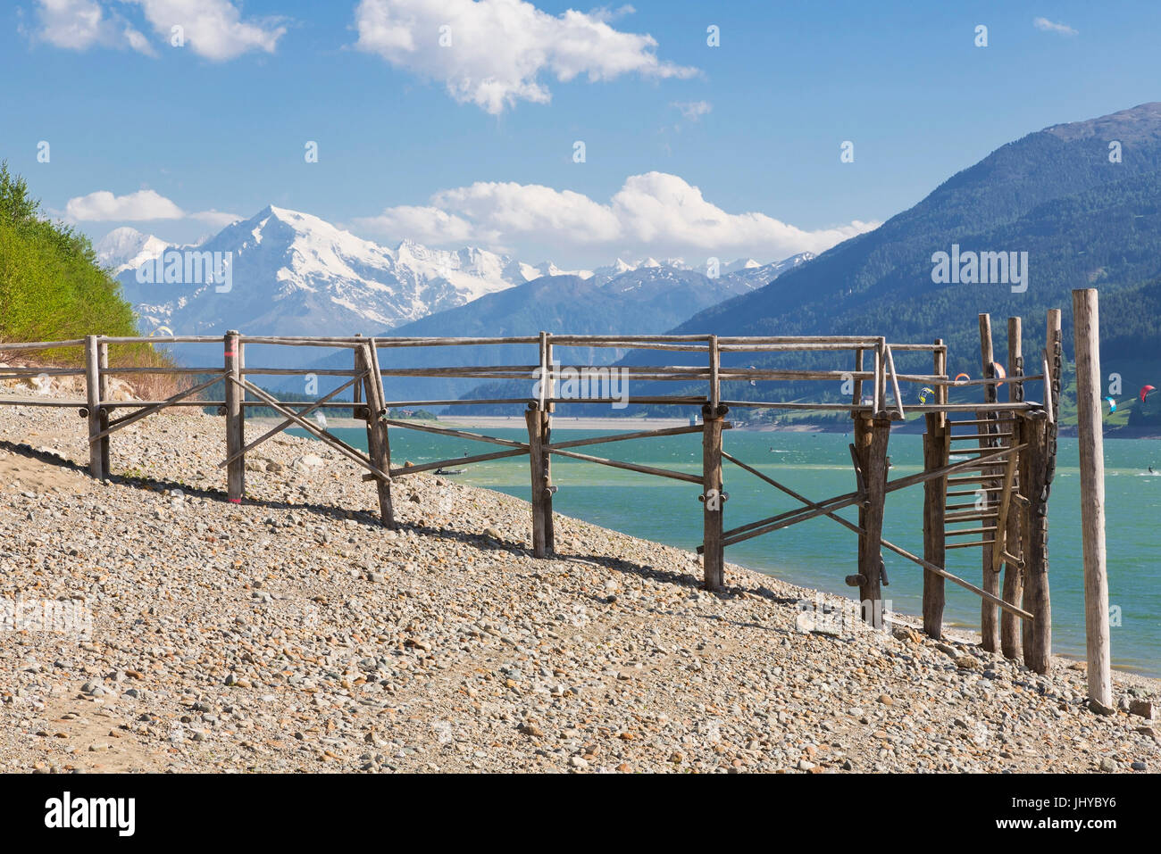 Footbridge in the crisp lake, Graun, Vinschgau, South Tirol, Italy - Landing stage, brine crisp lake in Graun, Vinschgau, South Tyrol, Italy, Steg am  Stock Photo