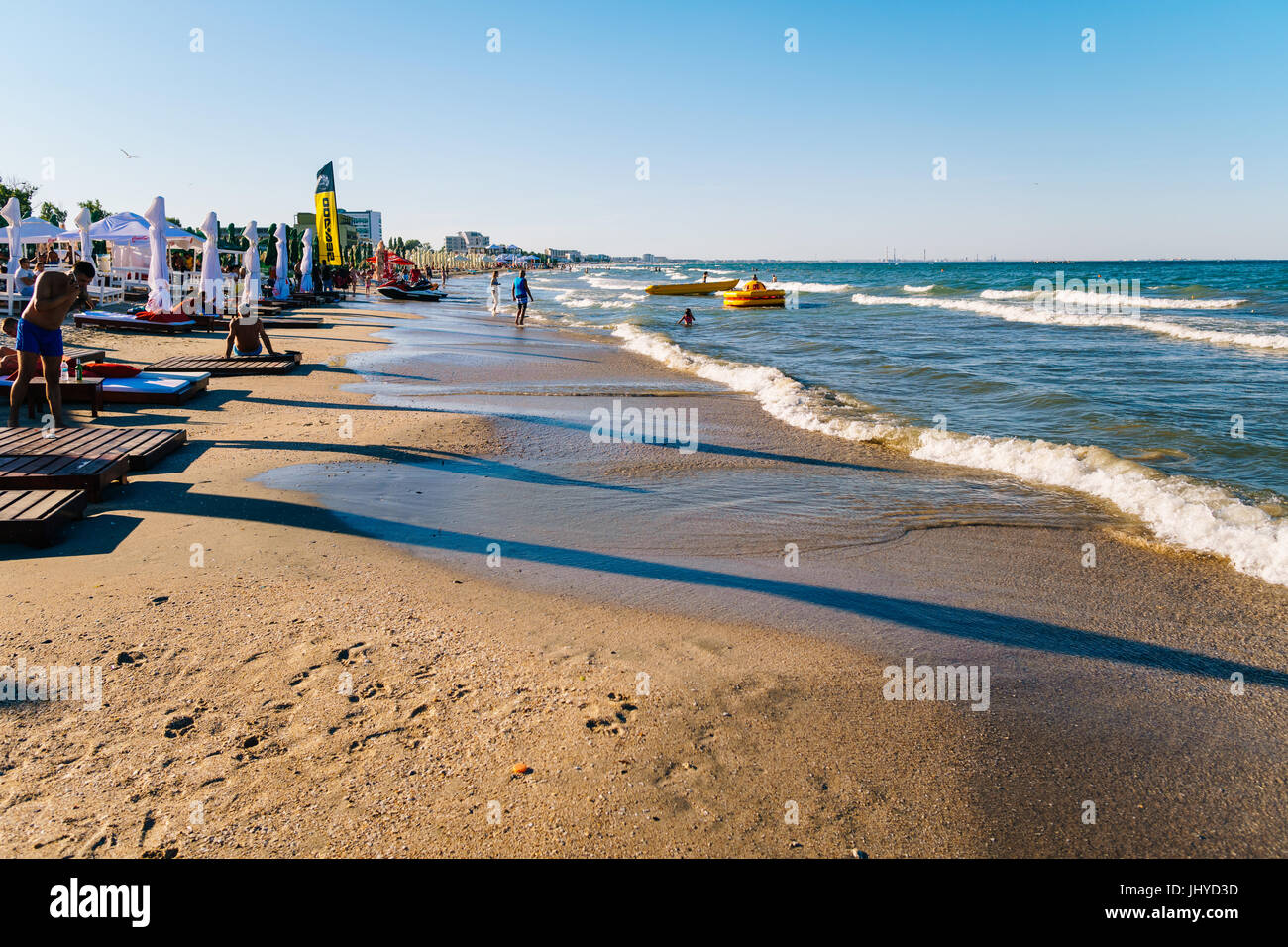 MAMAIA, ROMANIA - JULY 14, 2017: People Having Fun In Water And Relaxing In Mamaia Beach Resort At The Black Sea In Romania. Stock Photo