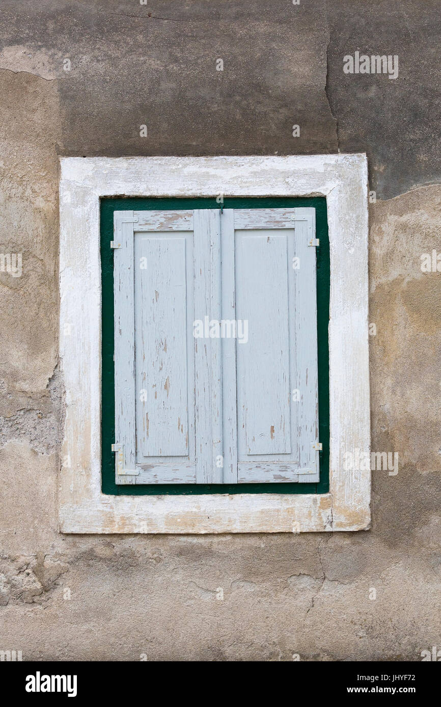 Old window with grey shutters, Hohenthurn, Carinthia, Austria - Old window with grey shutters, Austria, Carinthia, Hohenthurn, Altes Fenster mit graue Stock Photo