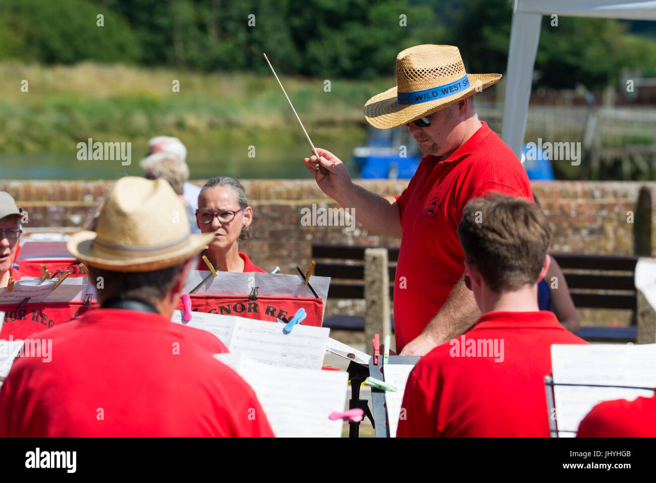 Man conducting the Bognor Regis Concert Band at an outdoor Summer event in the UK. Stock Photo