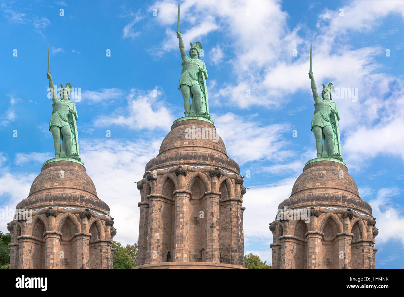 Computer-generated image, three times the statue of the Cherusque prince Arminius in the Teutoburg Forest. Stock Photo