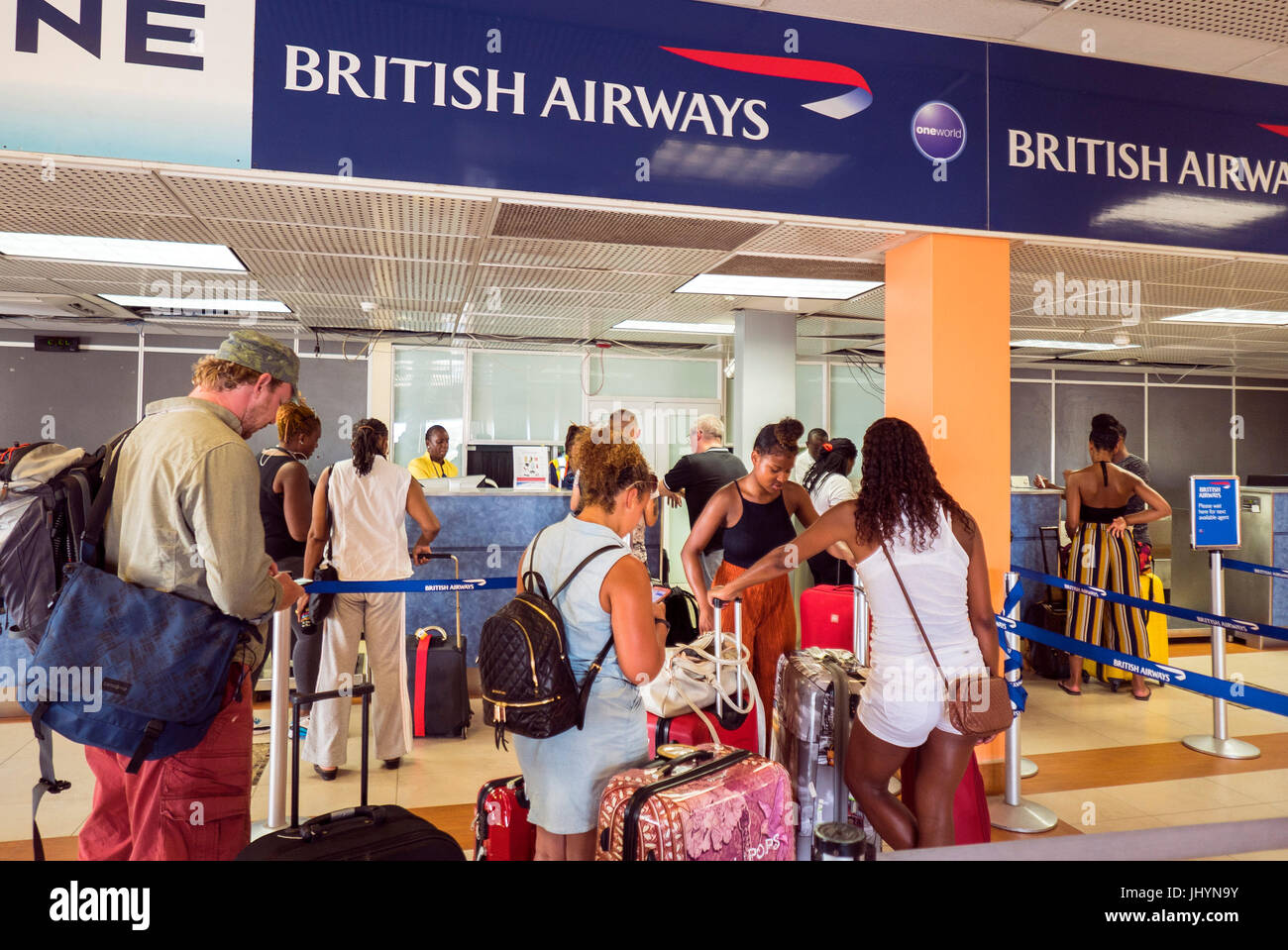 Customers check in for a flight in the Caribbean Stock Photo
