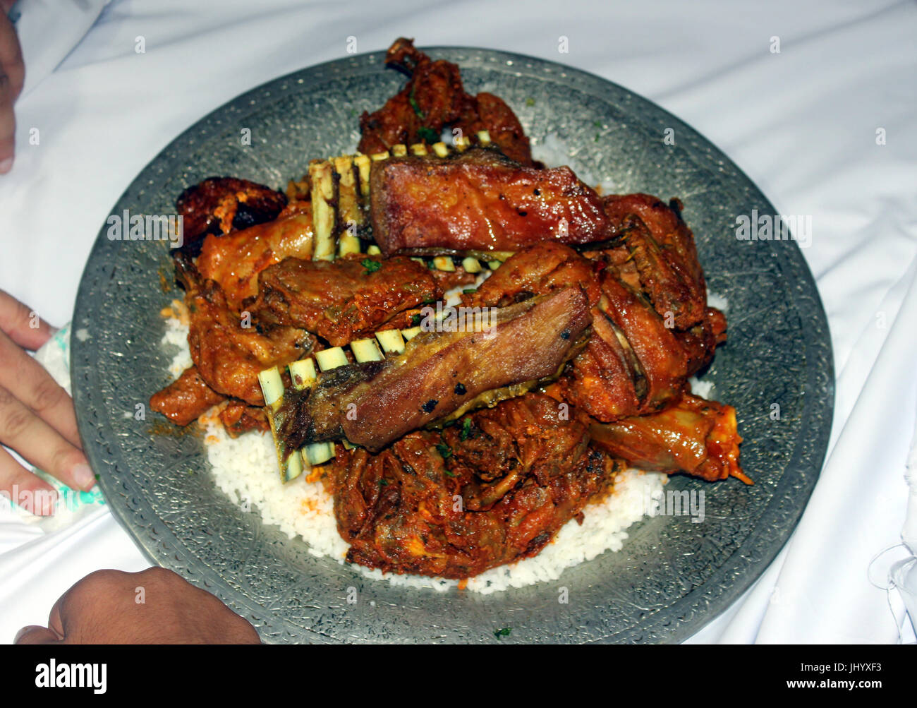 Anantnag, India. 16th July, 2017. Wazwan is a multicourse meal in