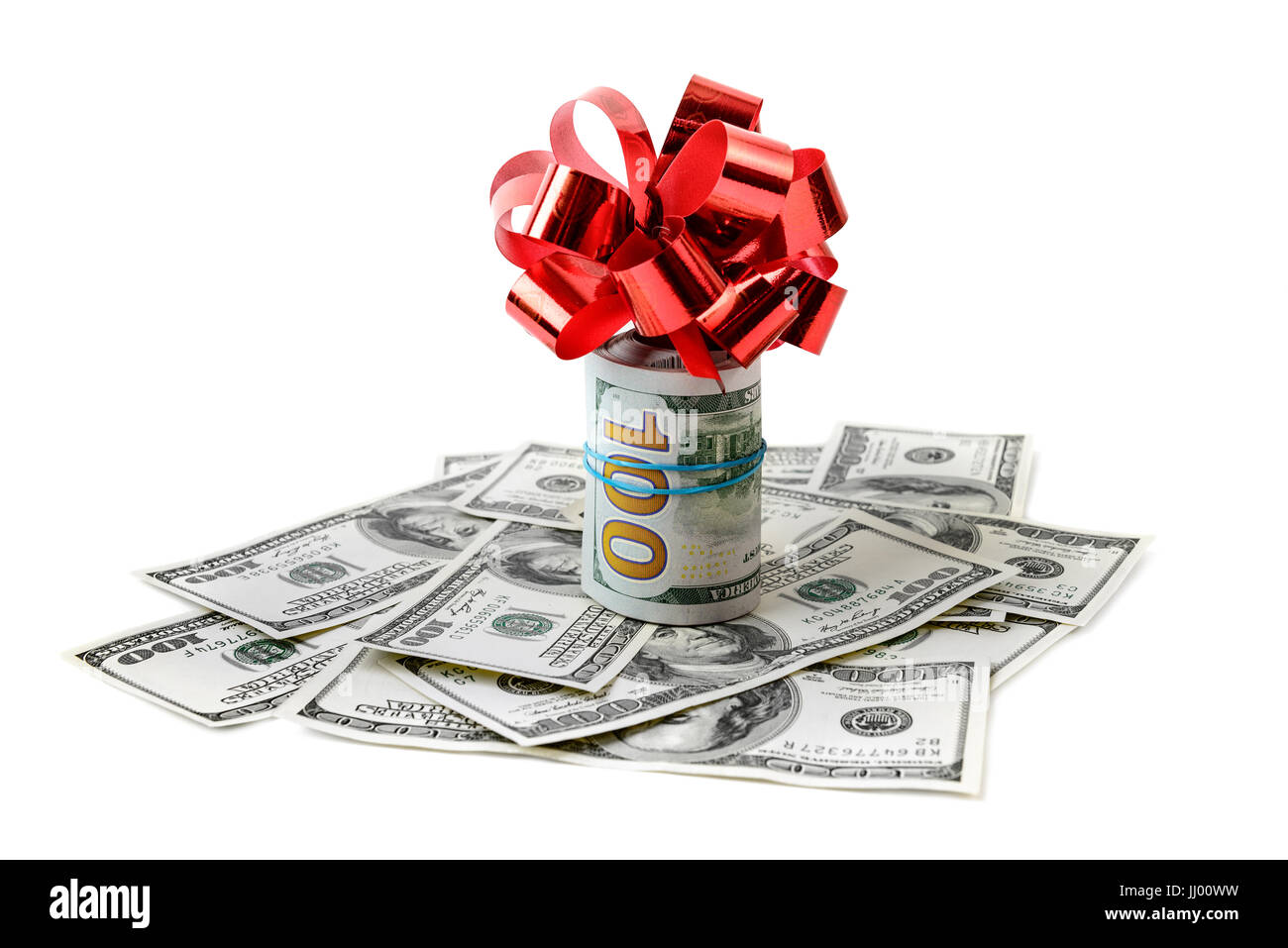 Dollars with red bow isolated on white Stock Photo