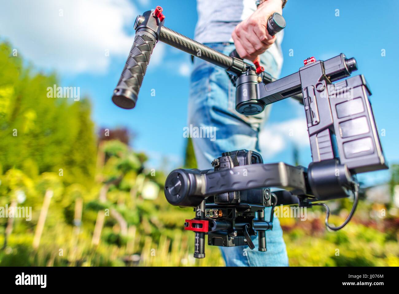 Video Camera Operator. Videography Theme. DSLR Camera on the Gimbal