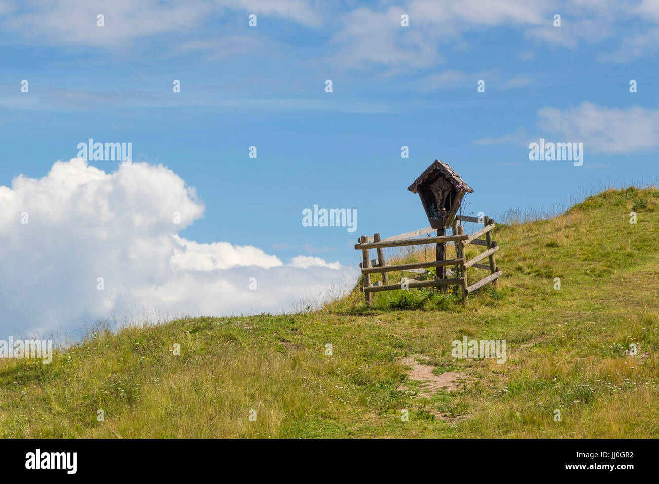 Marterl, block in the border triangle, Arnoldstein, Carinthia, Austria - Wayside-shrine on summit of border triangle in Arnoldstein, Carinthia, Austri Stock Photo