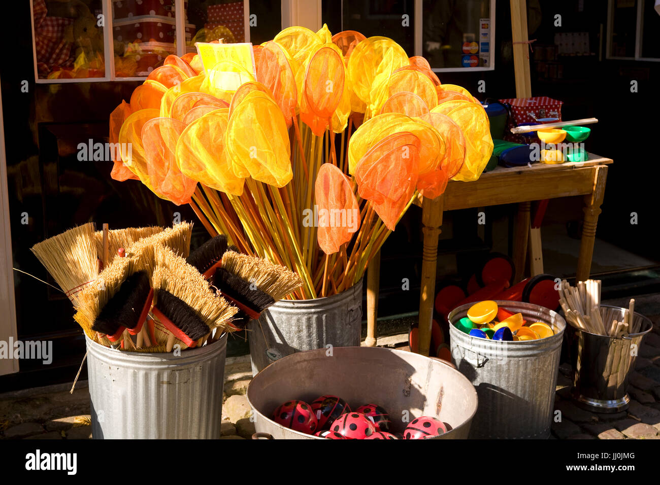 Europe, Netherlands, Zeeland, the village Veere on the peninsula Walcheren, shop at the market place, products on offer, brailer, brooms. Stock Photo
