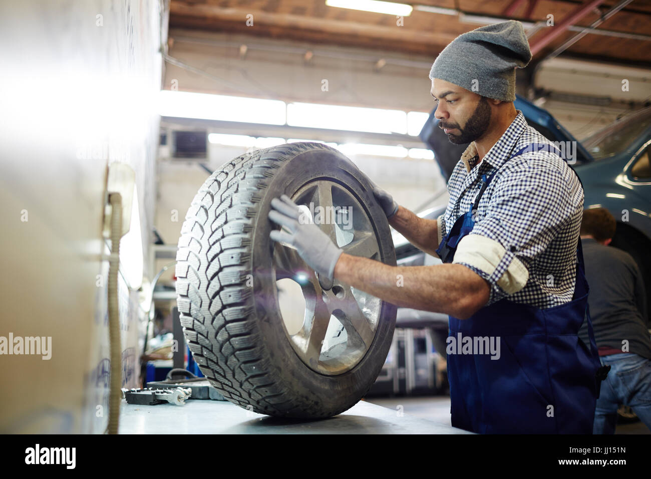 Tire change service Stock Photo Alamy