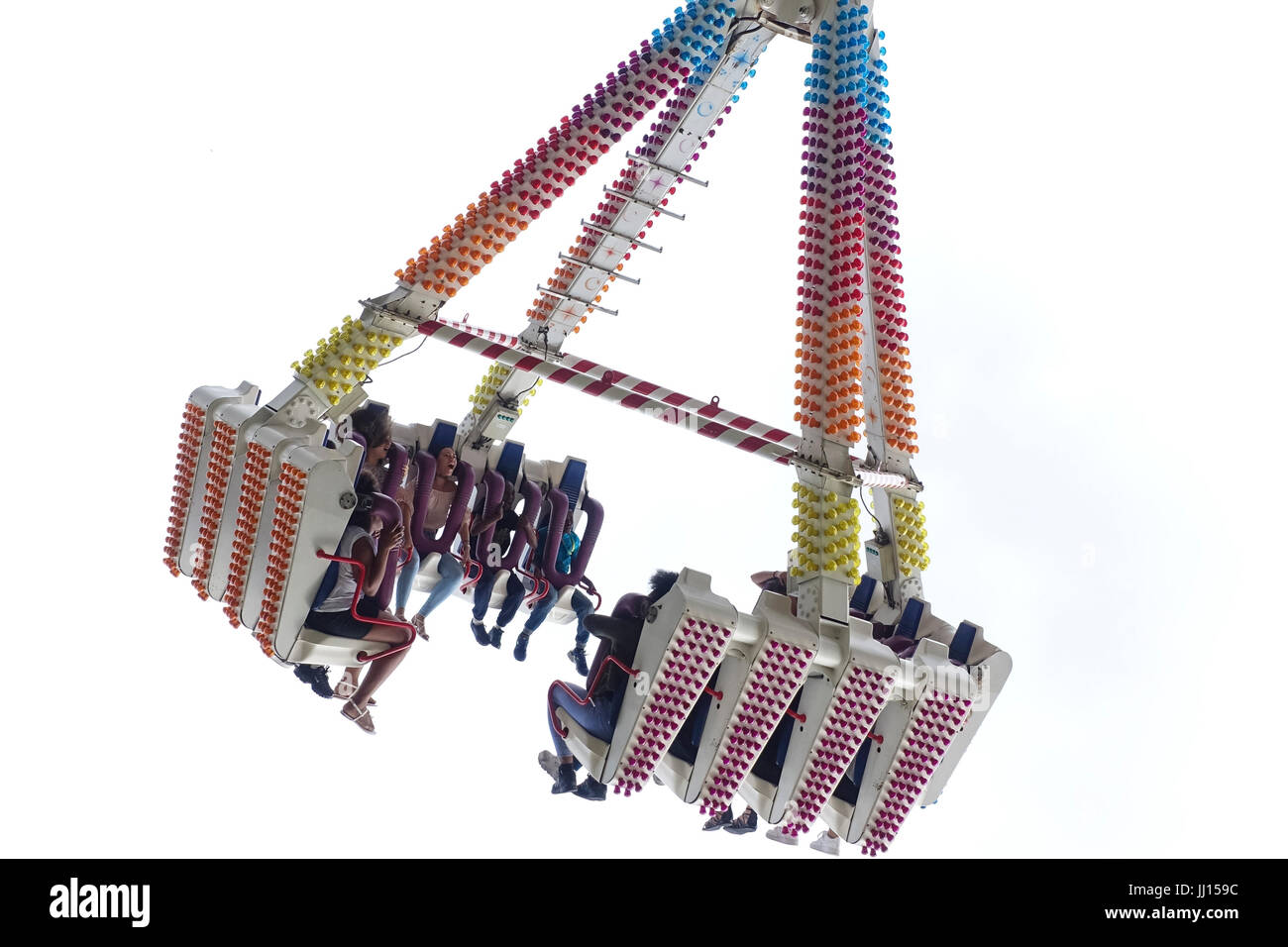 People Spinning in the air at a fairground ride Stock Photo