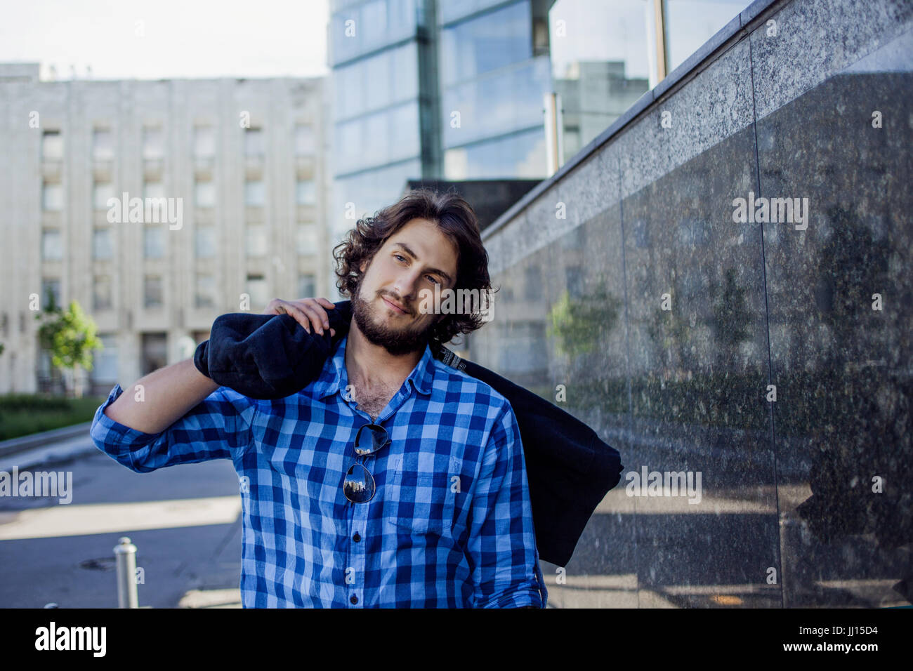 Portrait of young handsome stylish man on the street Stock Photo - Alamy