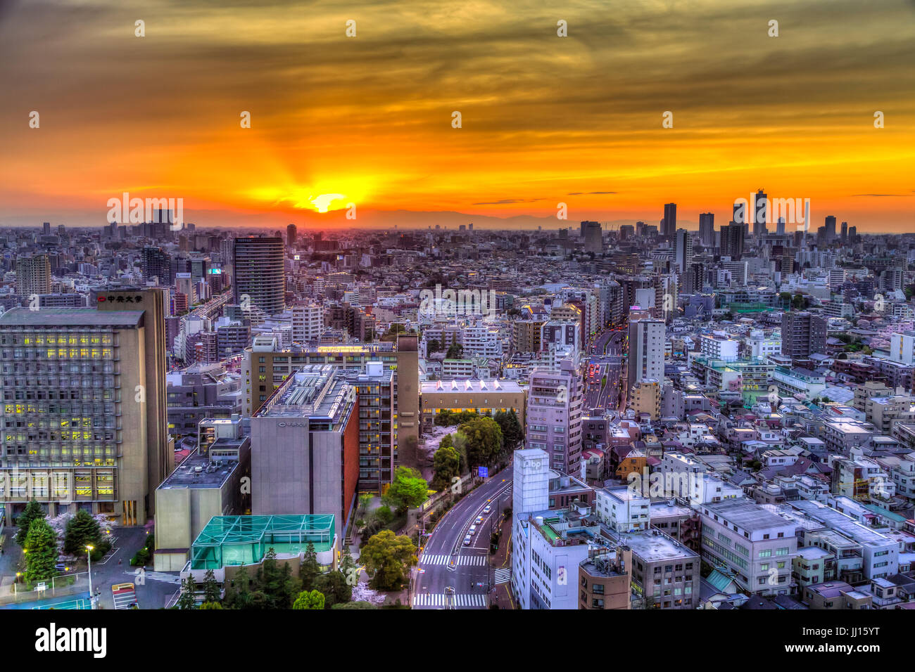 The city skyline at sunset from the Bunkyo Civic Center Building, Tokyo, Japan. Stock Photo