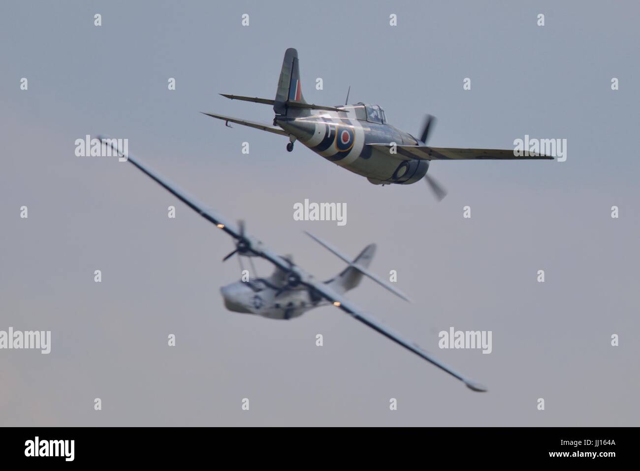 Grumman Wildcat & PBY Catalina flying together at the Flying Legends Air Show Stock Photo