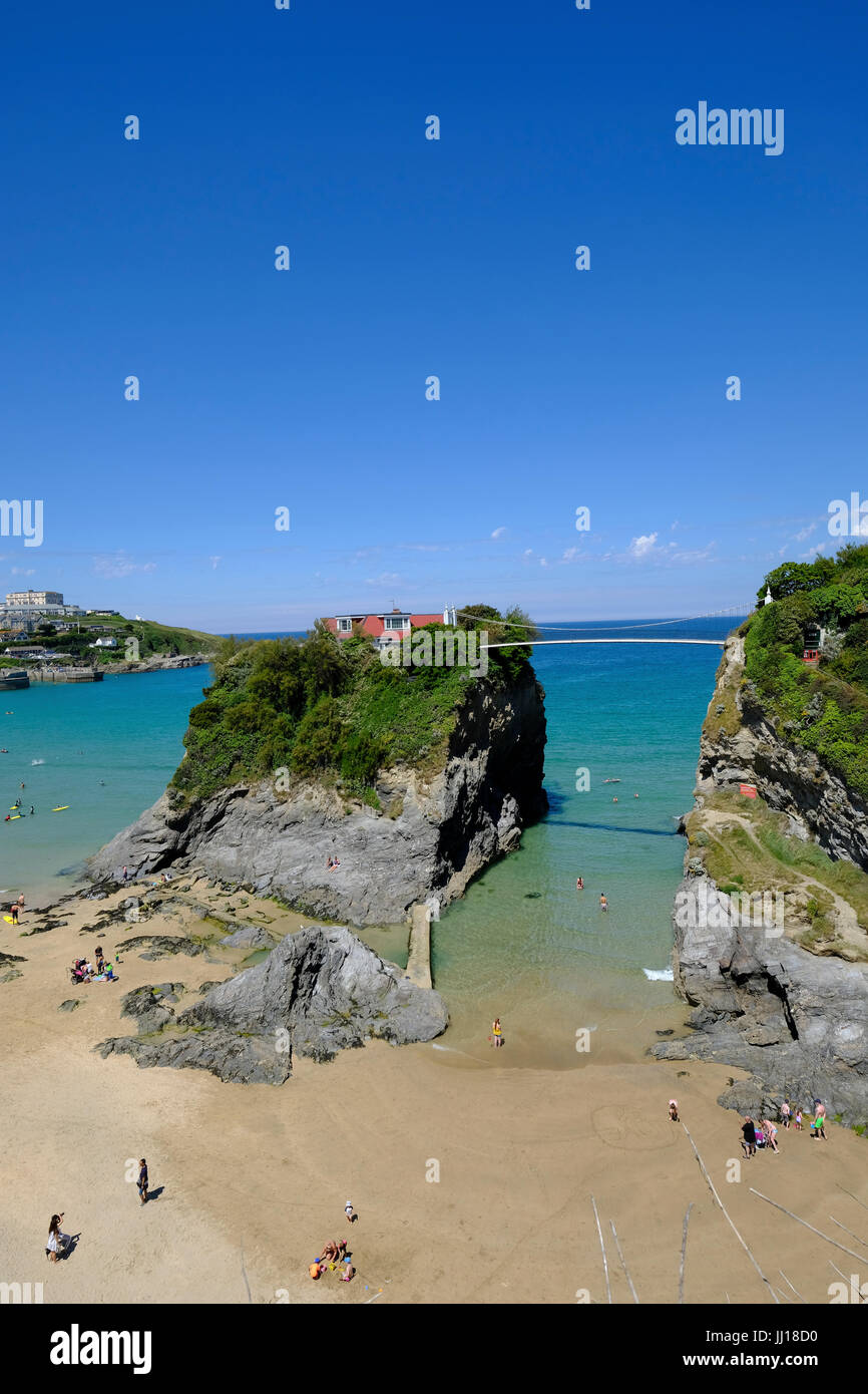 'The House in the sea' is a holiday let accessed across a suspension bridge at Newquay in Cornwall Stock Photo
