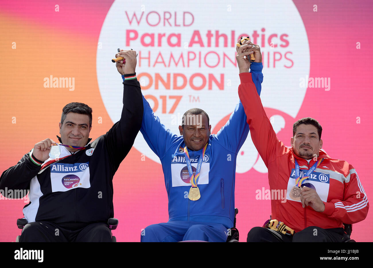 Islamic Republic of Iran's Ali Mohammadyari, Cuba's Leonardo Diaz and Egypt's Ibrahim Ibrahim after the  Men's Discus Throw F56 Final during day four of the 2017 World Para Athletics Championships at London Stadium. PRESS ASSOCIATION Photo. Picture date: Monday July 17, 2017. See PA story ATHLETICS Para. Photo credit should read: Victoria Jones/PA Wire. RESTRICTIONS: Editorial use only. No transmission of sound or moving images and no video simulation. Stock Photo