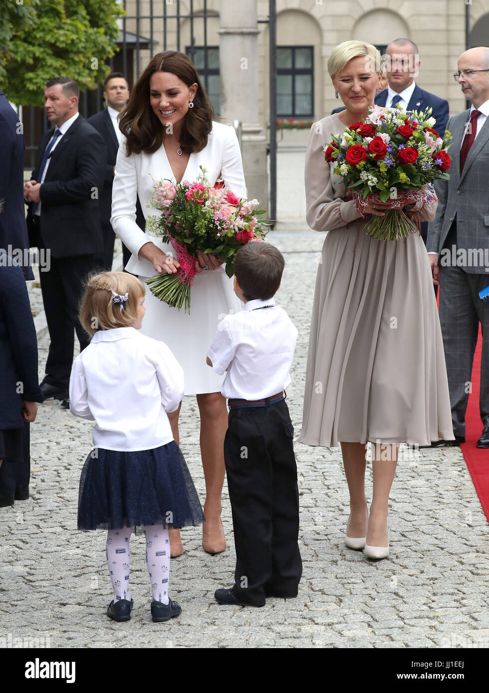 The Duchess of Cambridge meets young wellwishers with Poland's First Lady Agata Duda at the Presidential Palace in Warsaw, Poland, on the first day of her five-day tour of Poland and Germany. Stock Photo