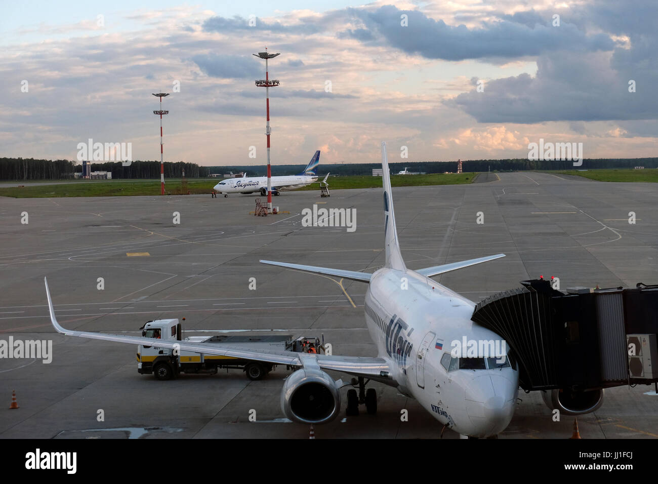 Airplanes at the tarmac of Yuzhno-Sakhalinsk Airport also called Khomutovo in the city of Yuzhno-Sakhalinsk, in the island of Sakhalin, in the Pacific Ocean. Russia Stock Photo