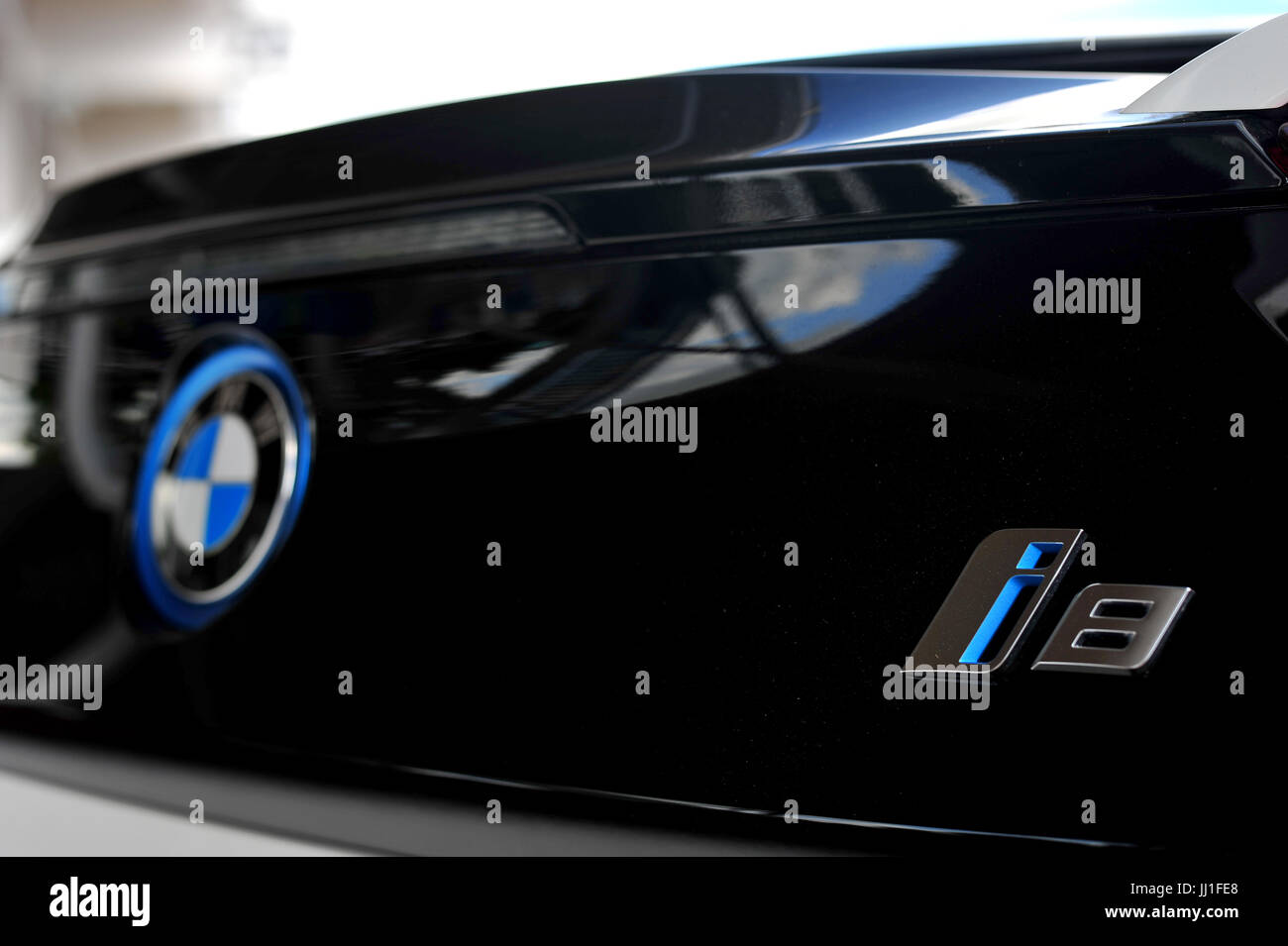 The blue electric BMW badge on an electric vehicle Stock Photo Alamy