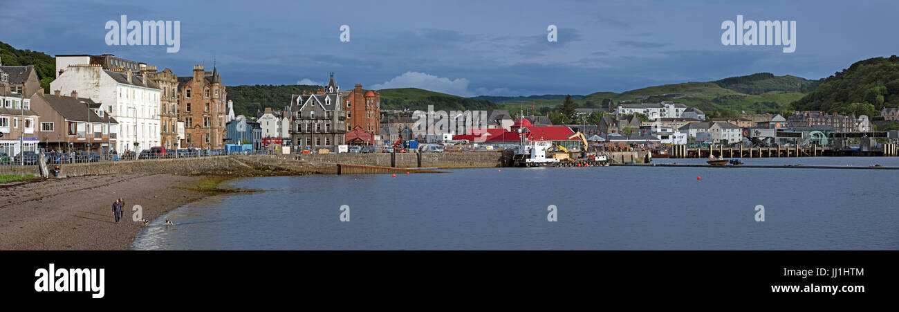 Shops, hotels and restaurants along the North Pier in the harbour of Oban, Argyll and Bute, Scotland, UK Stock Photo