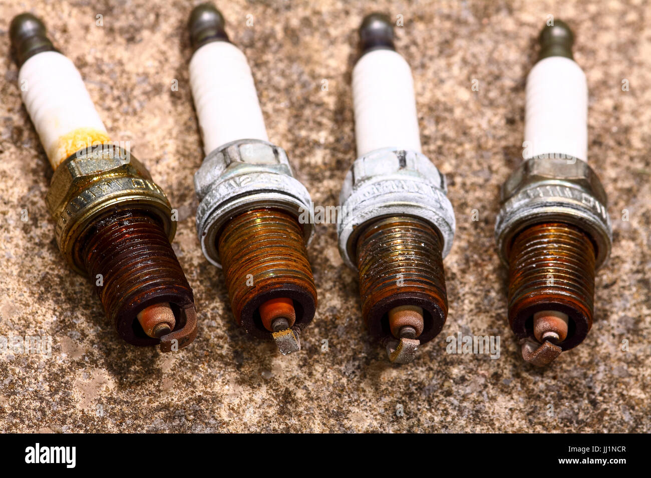 Used spark plug from a car engine Stock Photo Alamy