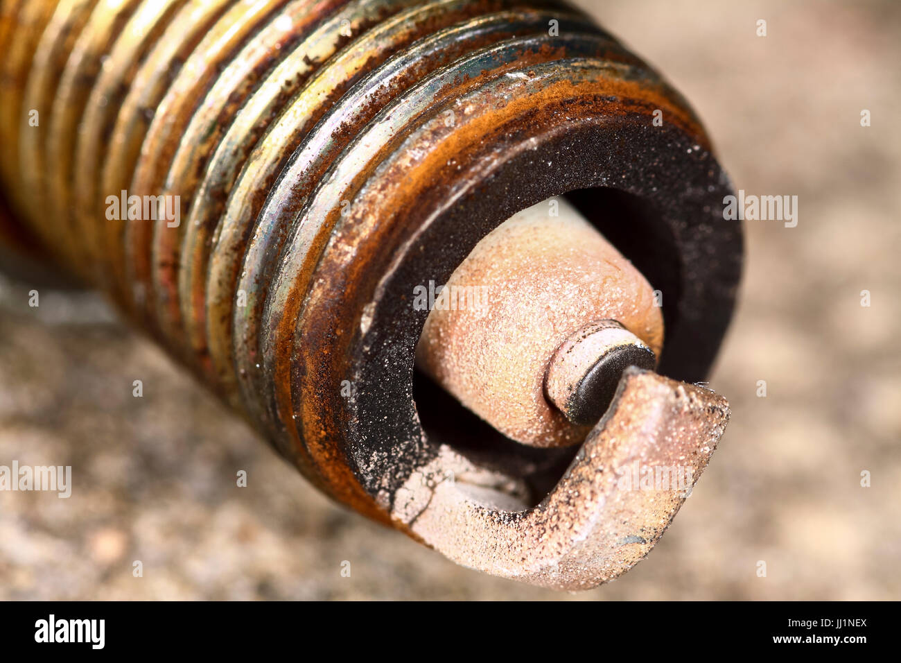 Used spark plug from a car engine Stock Photo Alamy