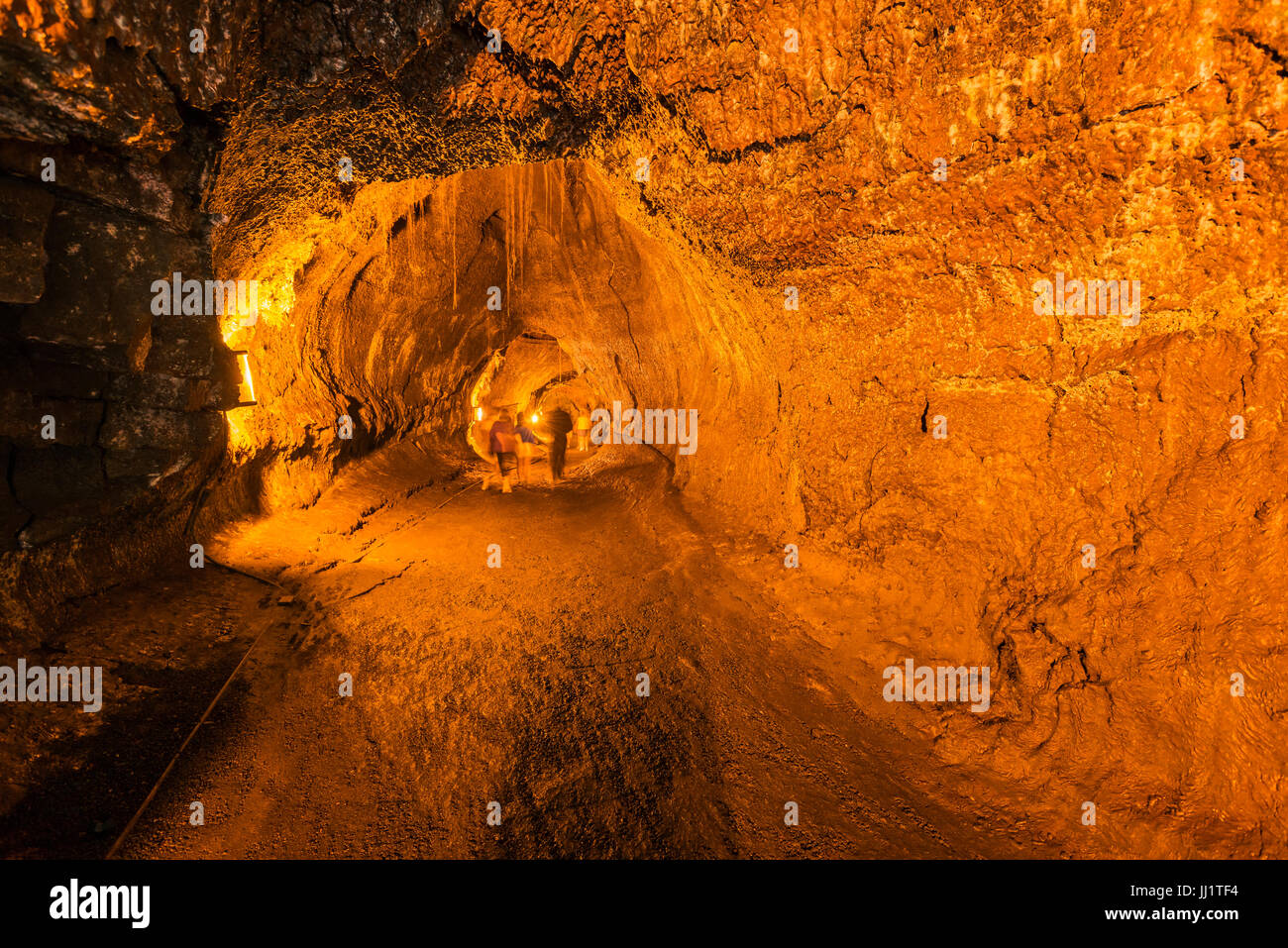 Visitors inside the Thurston Lava Tube, Hawaii Volcanoes National Park, Hawaii USA Stock Photo