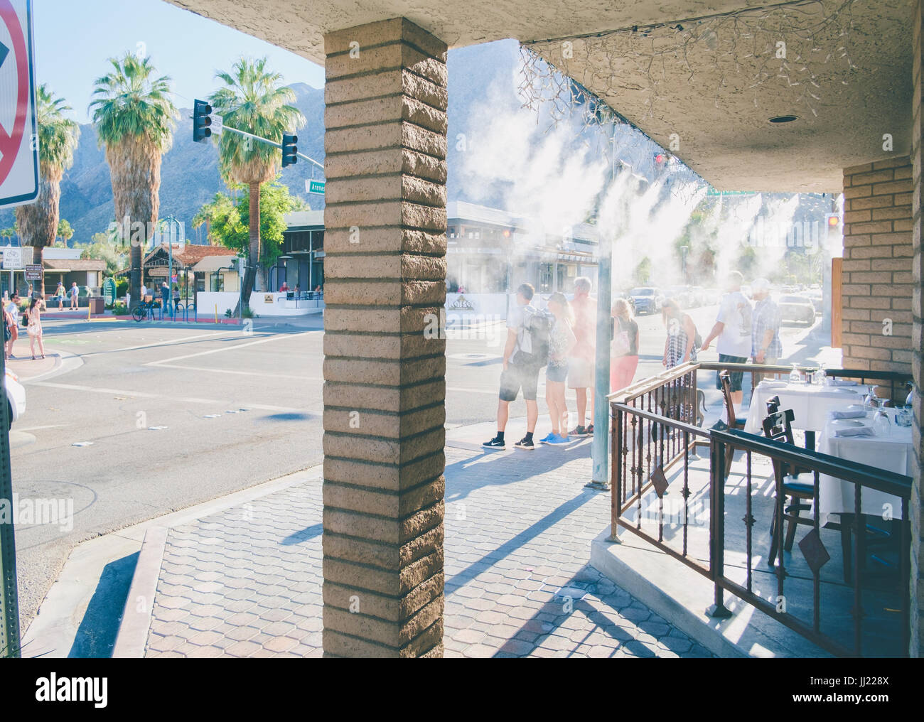 Mister outside a restaurant in Palm Springs, California, 110 degrees in May Stock Photo